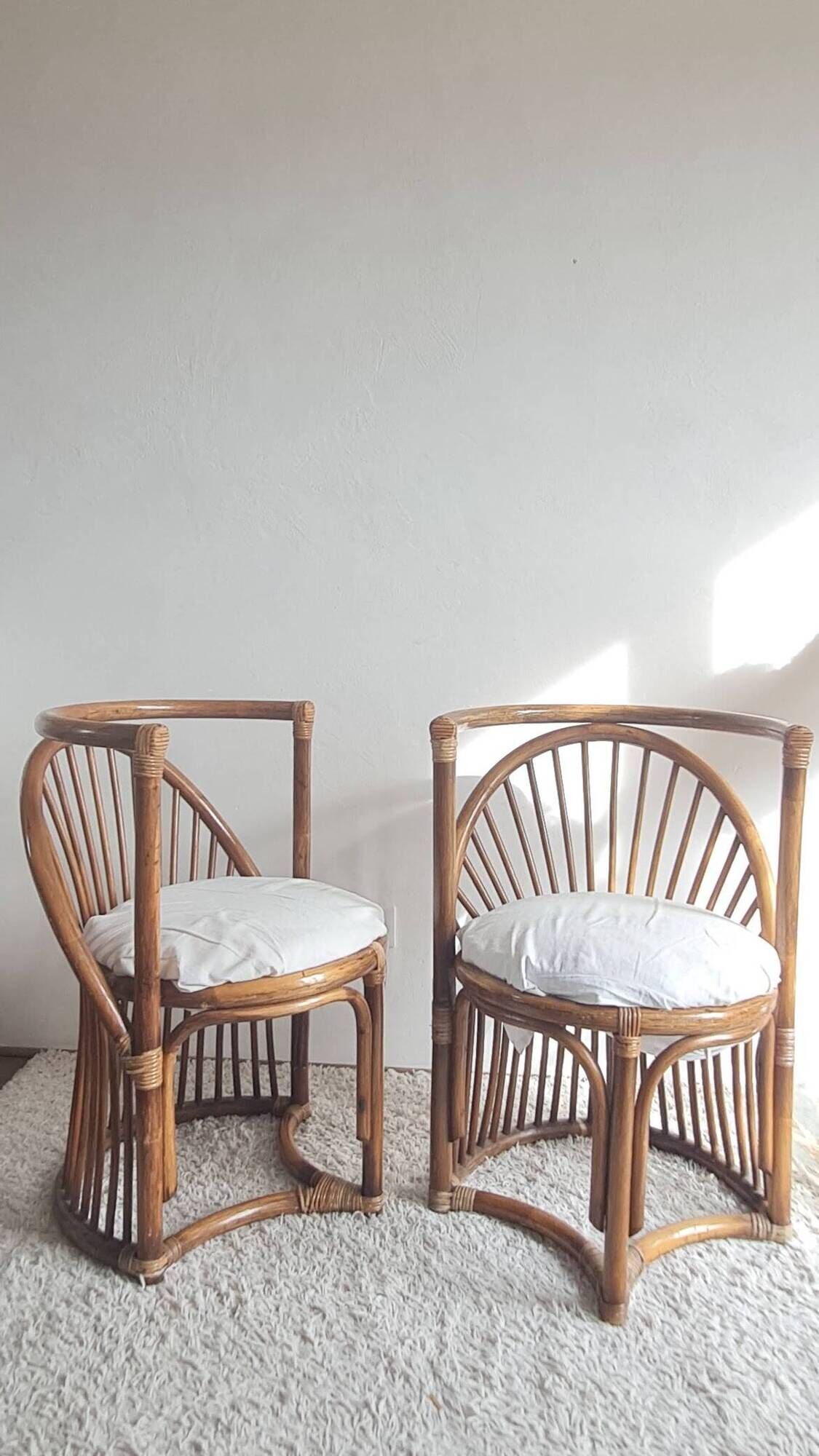 Pair of vintage rattan armchairs circa the 1960s.