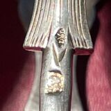 Engraved sugar tongs in solid silver with Minerva hallmark and lion's claws