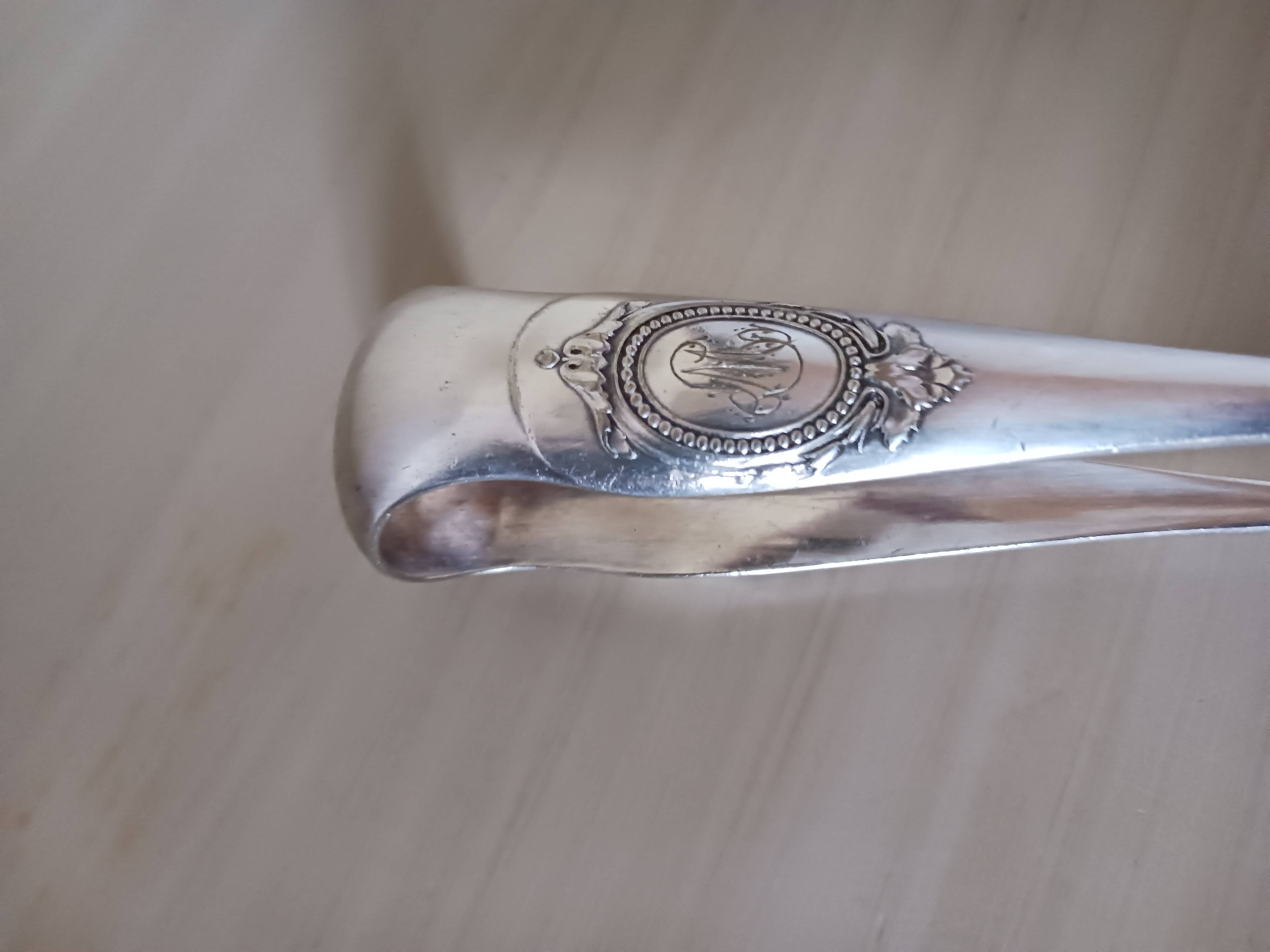 Christofle sugar tongs.