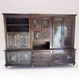 Wooden dresser with glass display cases and TV area with rotating tray