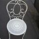 Pair of old wrought iron garden chairs