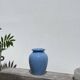 Minimalist plain blue ceramic baluster vase