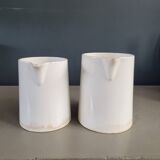 Pair of Digoin porcelain pitchers