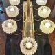 Eight-light chandelier in gilded brass and blue, 1950.