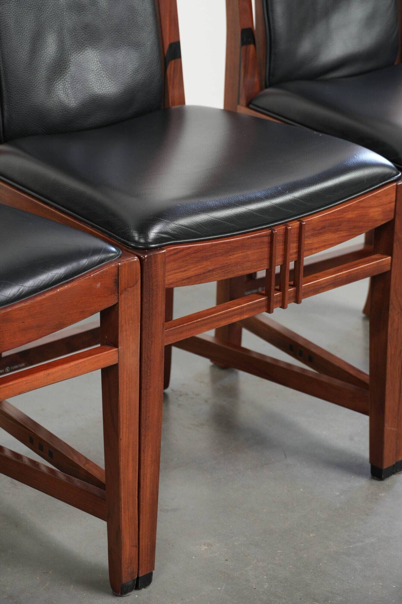 Elegant set of four black cowhide and wooden Art Deco dining chairs