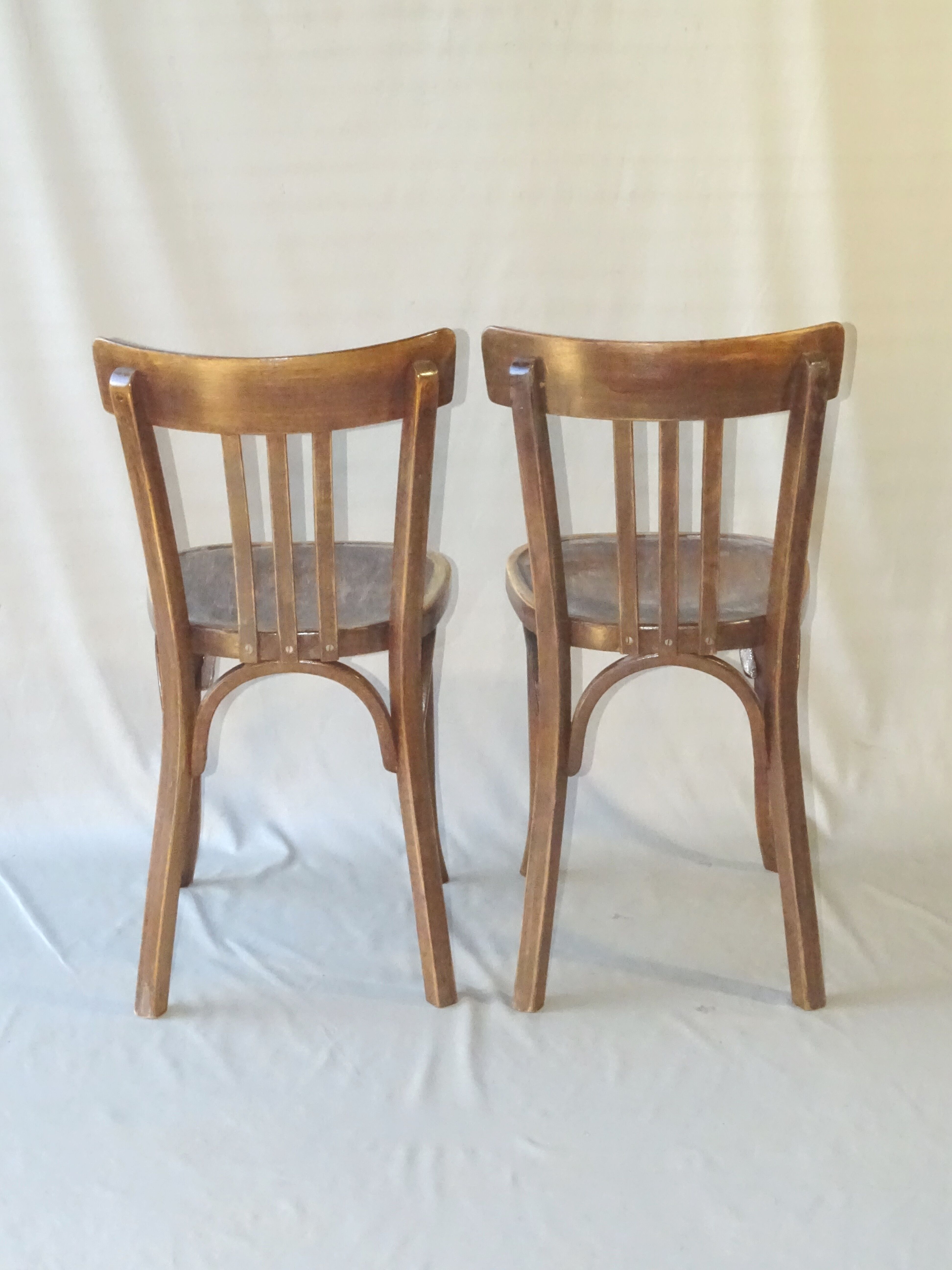 Paire de chaises bistrot Baumann 1955 assise bois