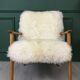 Vintage white sheepskin armchair
