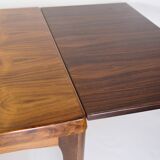 Dining Table With extensions Made In Rosewood By Henning Kjærnulf From 1960s