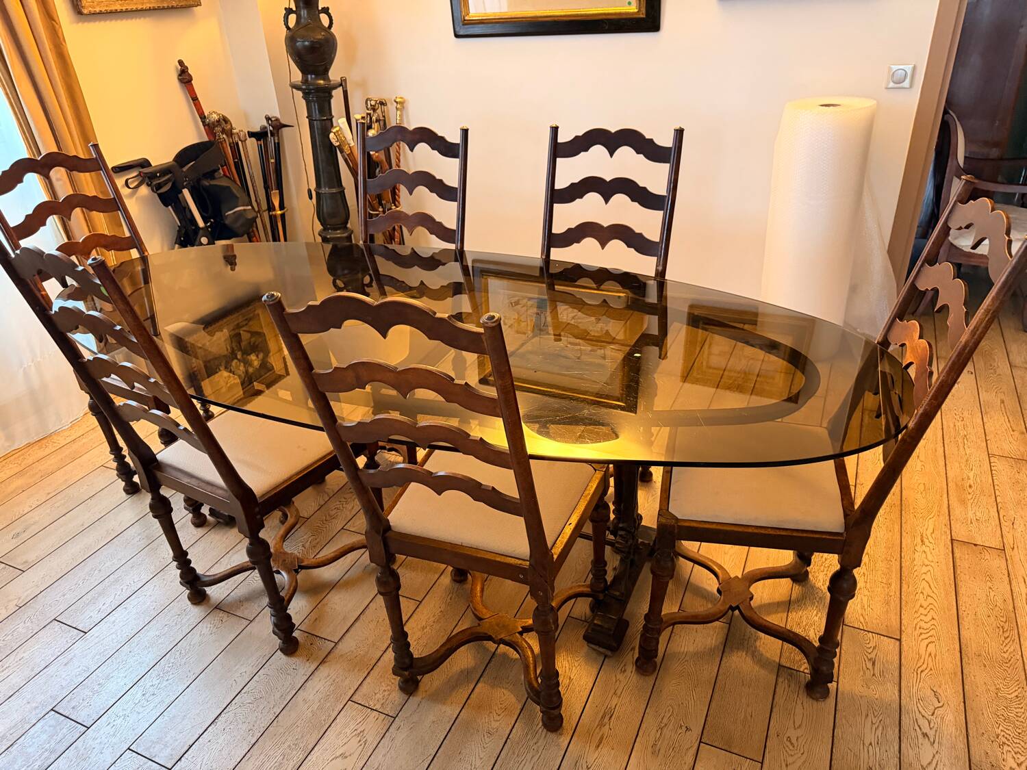 Large antique dining table in wrought iron and smoked glass,