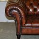 Pair of Early Victorian leather Chesterfield sofas by George Smith.