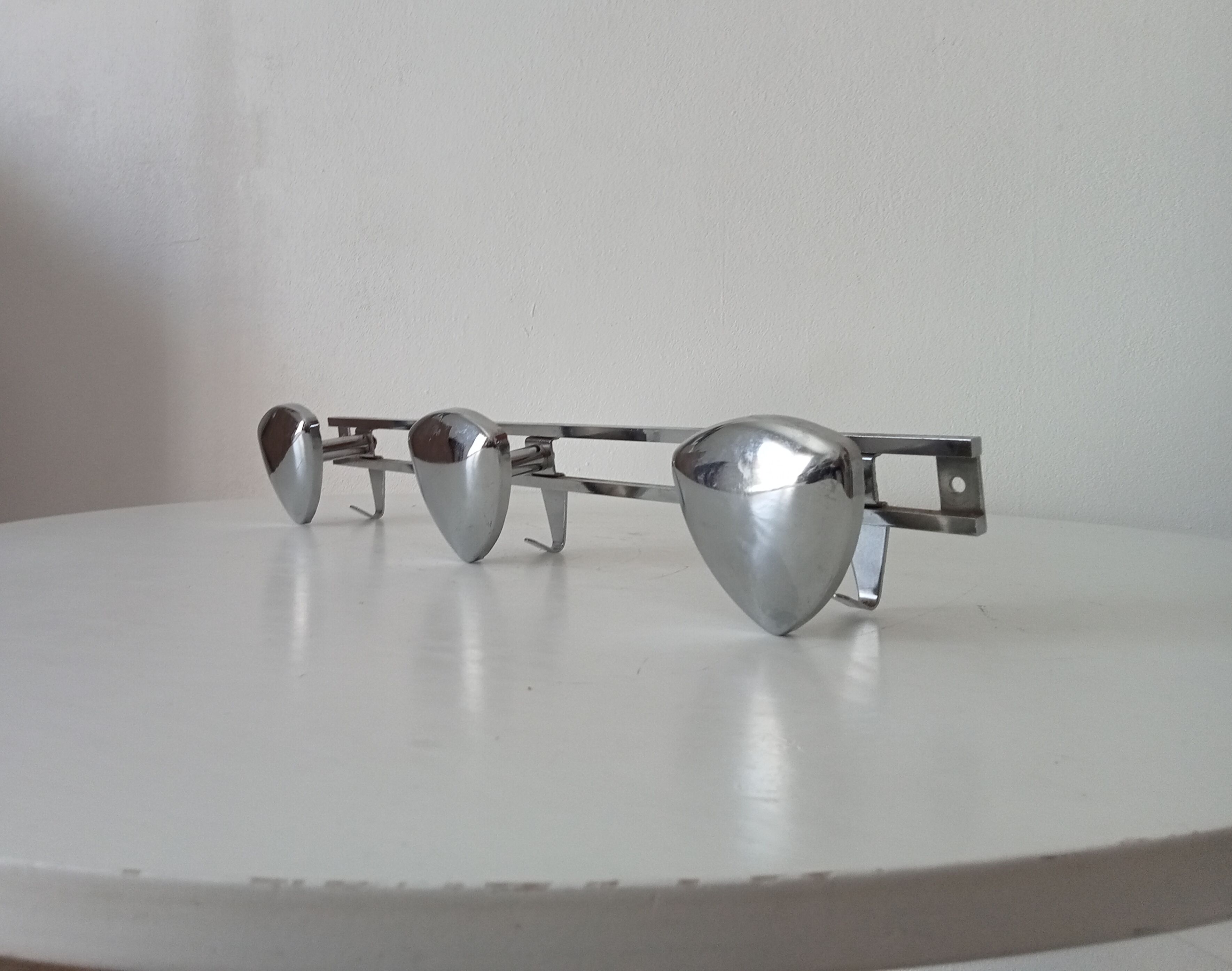 Vintage 1960s chrome wall coat rack automotive design