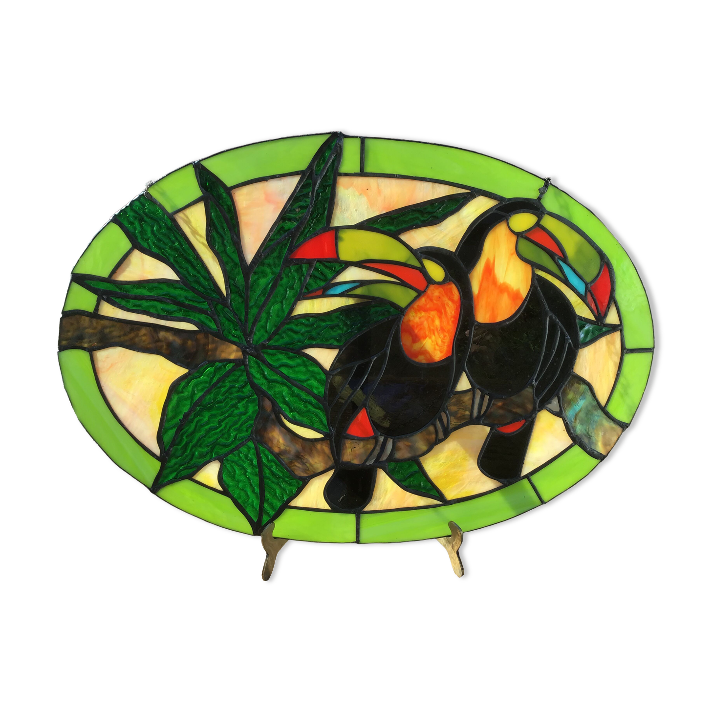 Art Deco style stained glass window representing a couple of toucans