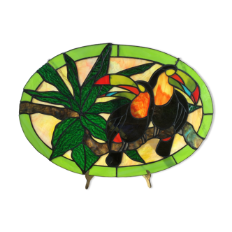 Art Deco style stained glass window representing a couple of toucans