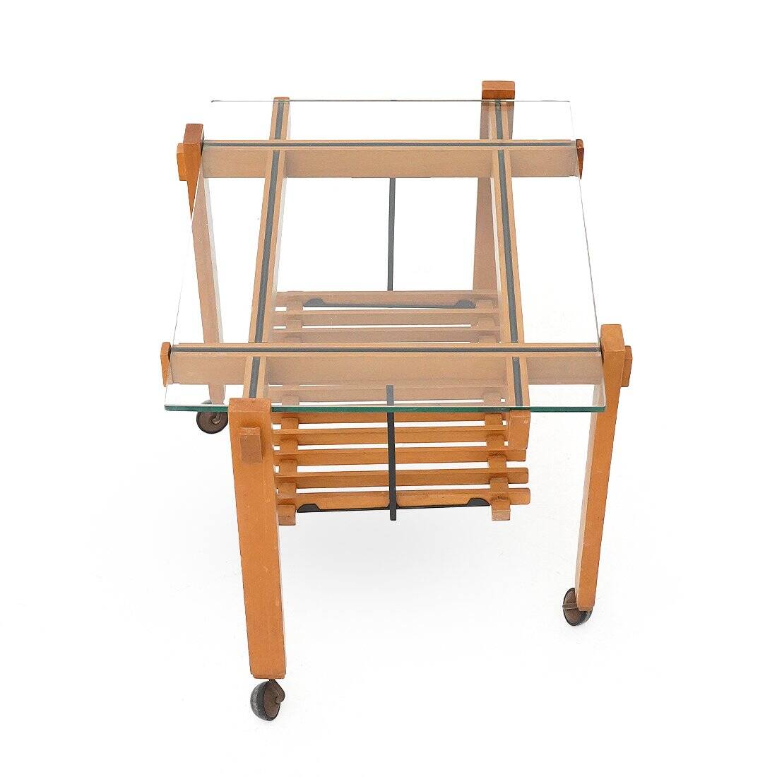 Wood and glass coffee table with wheels, 1960s.