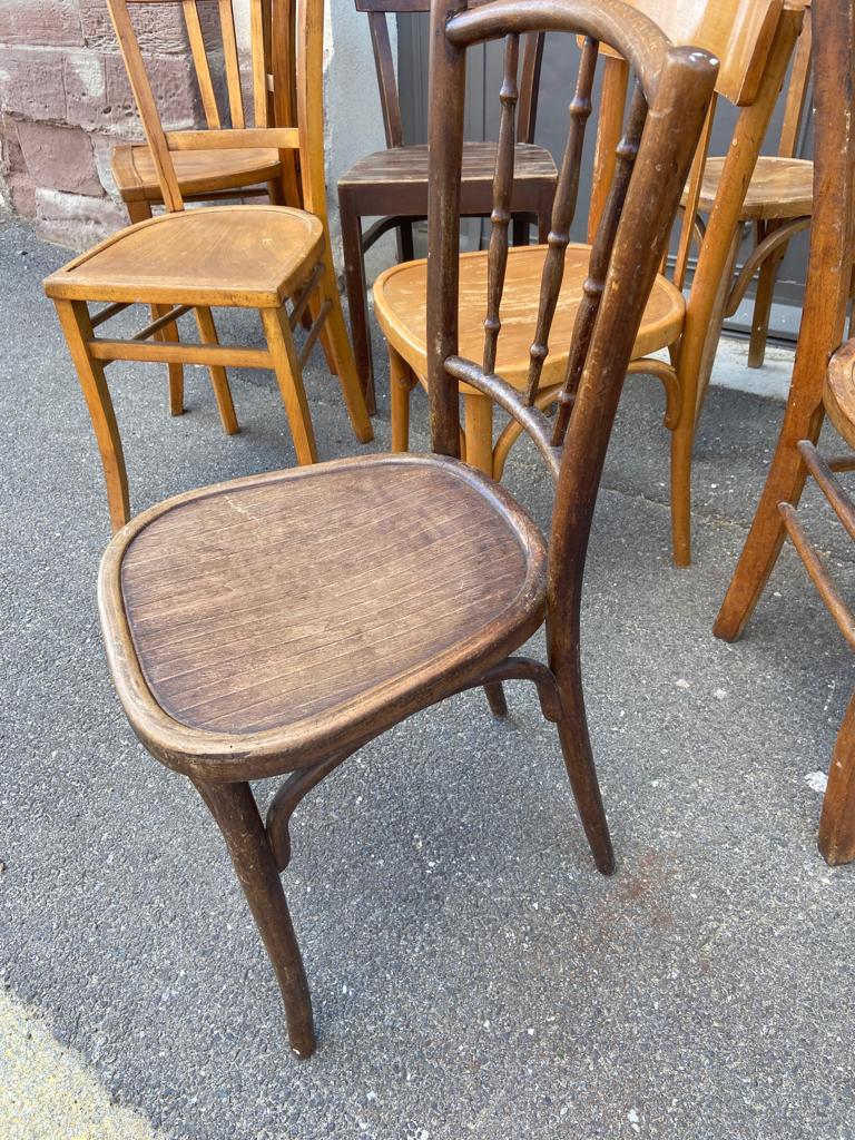 Set of 10 mismatched curved wood bistro chairs from the 1950s-60s