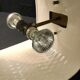 Golden ceramic cube wall light