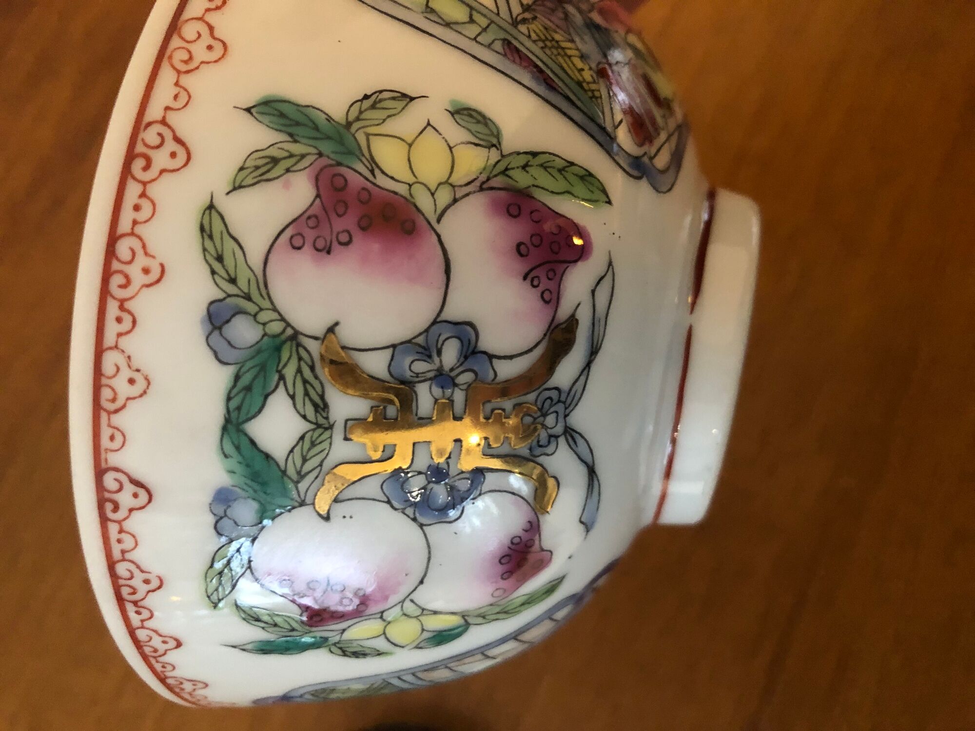 Chinese porcelain bowl on wooden base