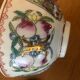 Chinese porcelain bowl on wooden base