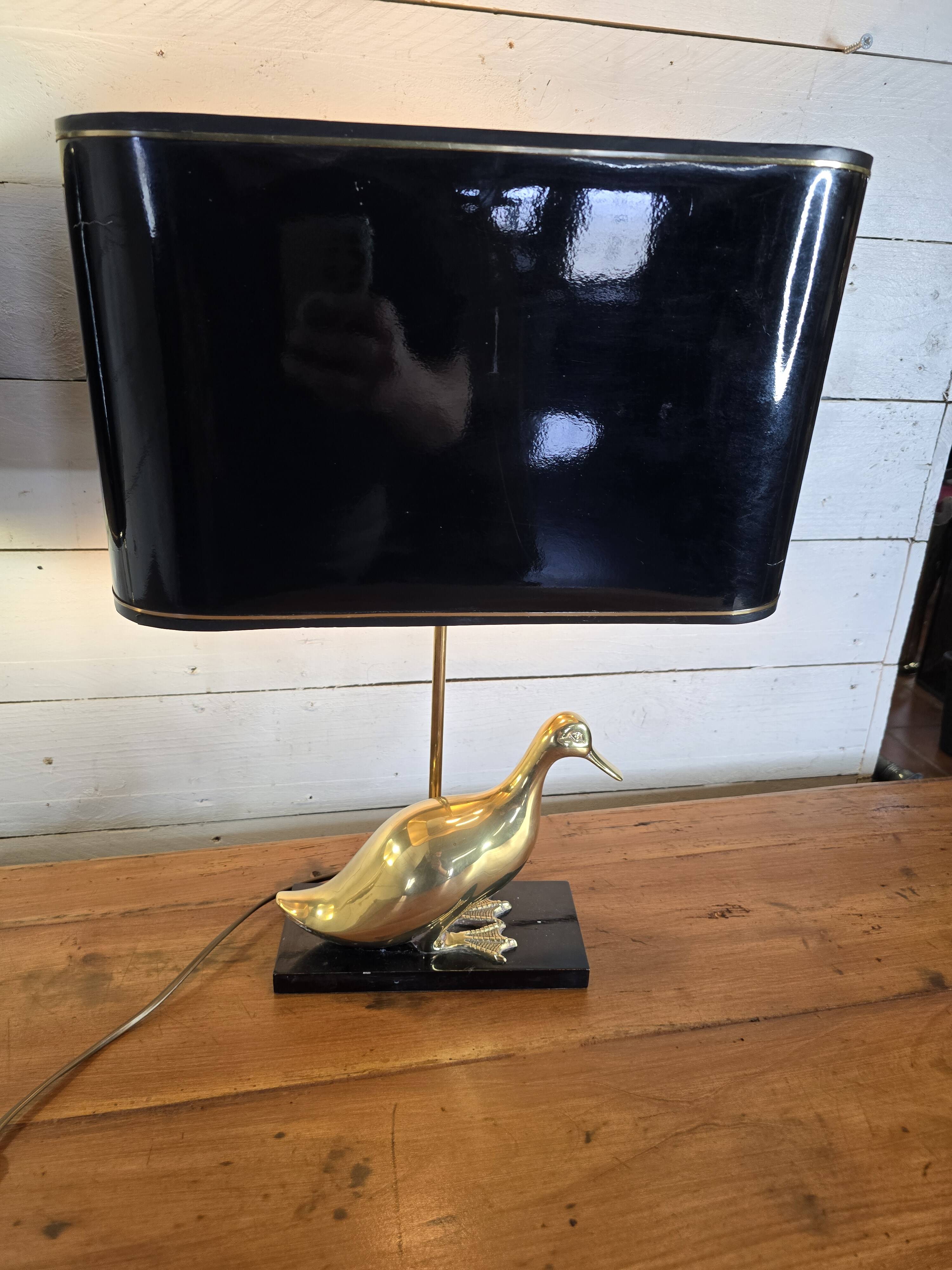 Pair of 70s table lamps featuring a brass duck