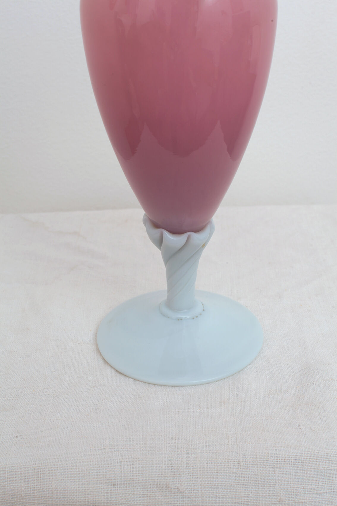 Pink vase foot twisted milk glass