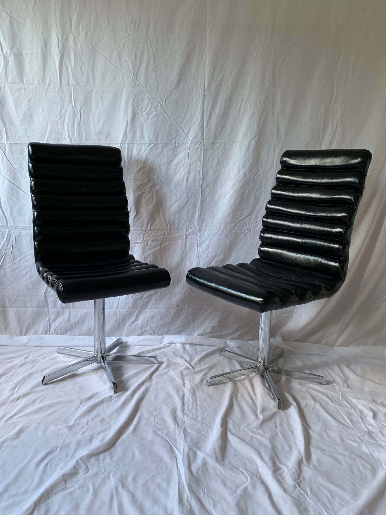 A set of four leather chairs, Italy, 80s
