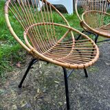 Vintage rattan armchair with metal legs