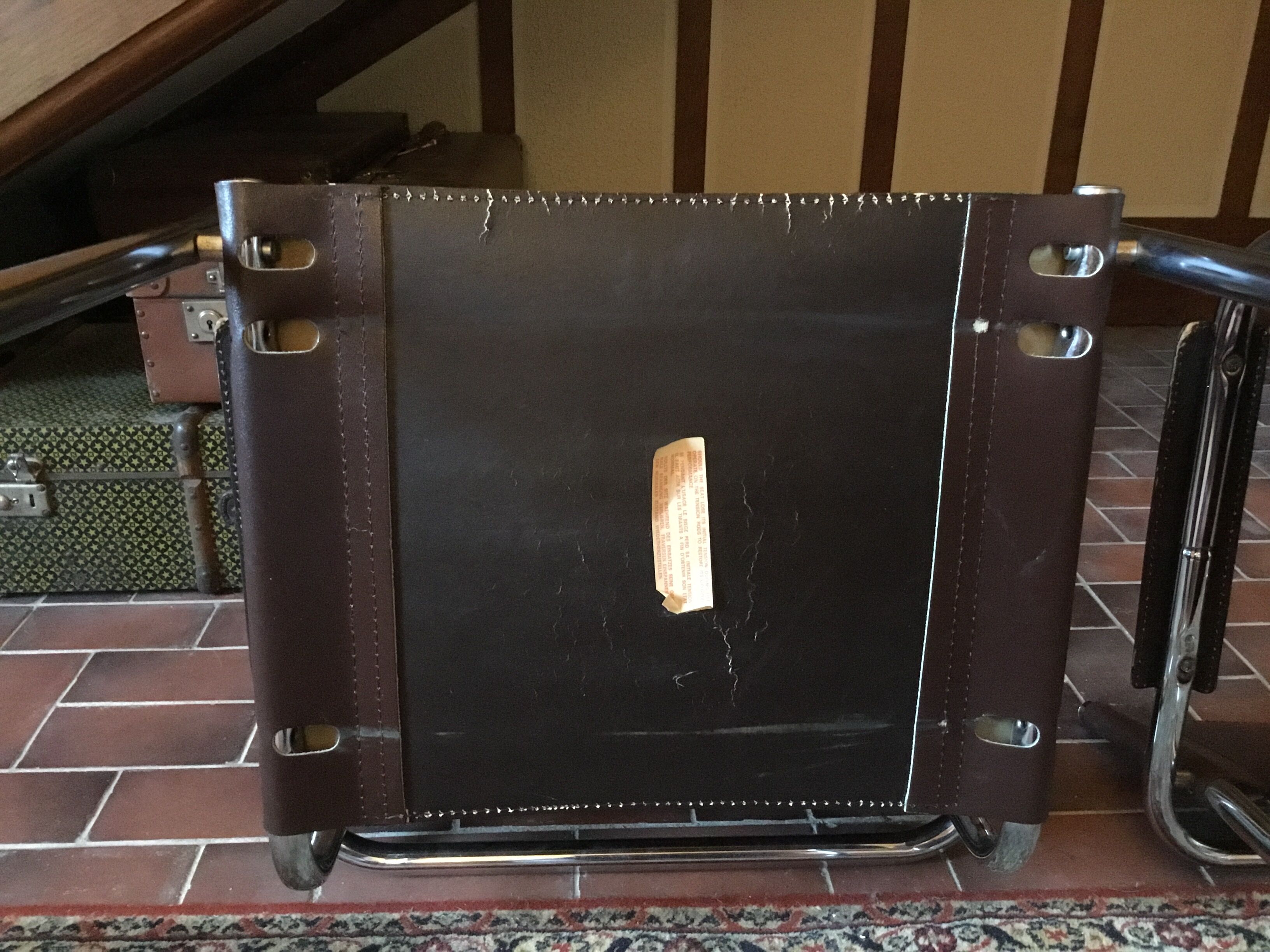 Leather and steel armchairs