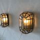 Pair of black iron wall sconces with structured glass by Limburg, 1960s, Germany.