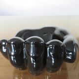"hand" in black ceramic trinket bowl 60/70