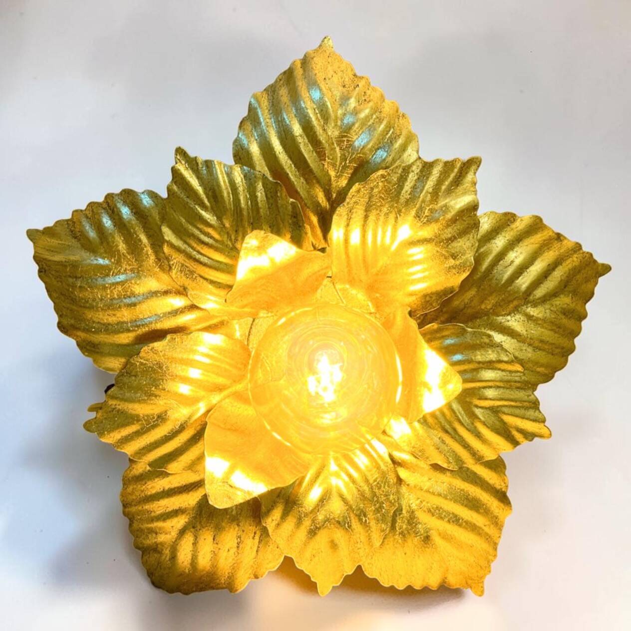 Vintage 1970s - 80s gold leaf metal flower wall light.