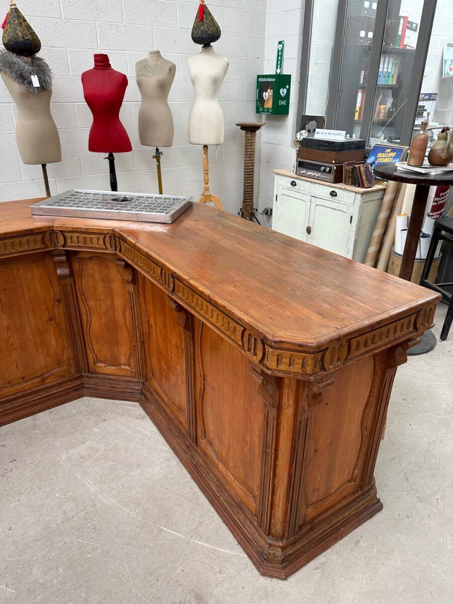 Large corner bar counter from the late 19th century.
