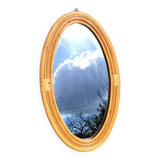 Oval rattan portrait mirror