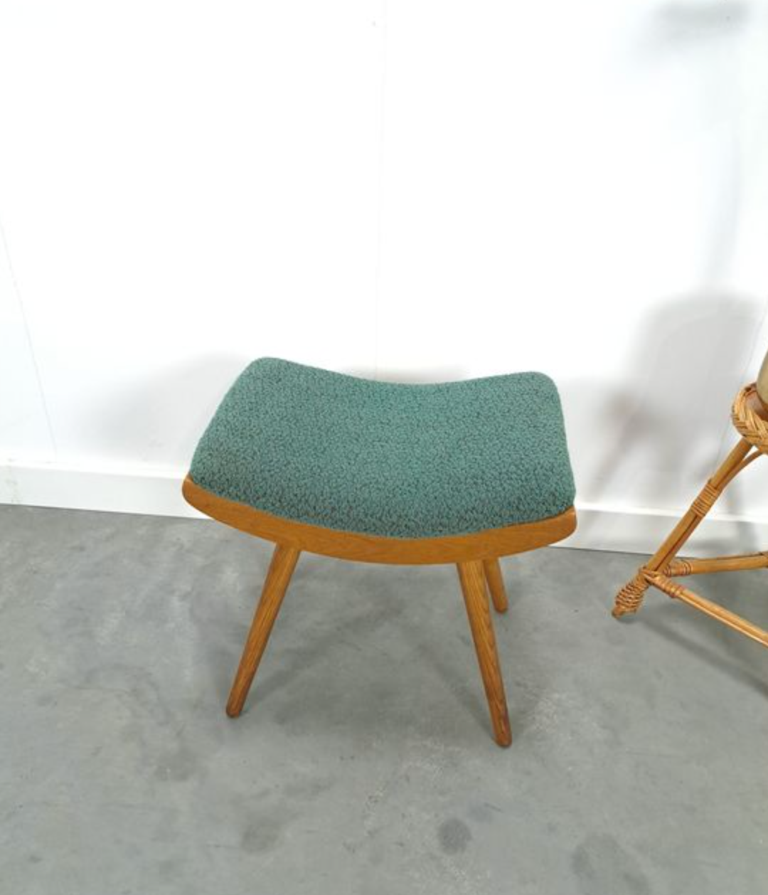 Vintage footrest stool with blue-green cushion