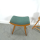 Vintage footrest stool with blue-green cushion