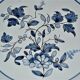Compotier A. Montagnon à décor de fleurs camaïeu bleu
