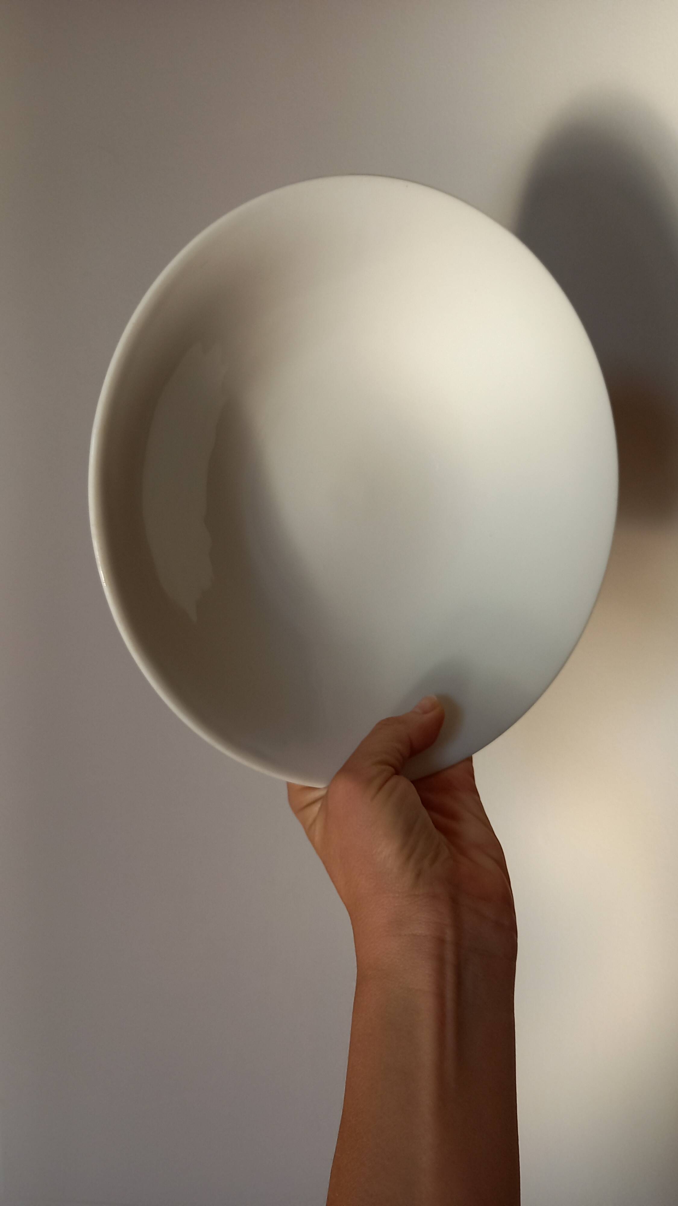 Small white porcelain fruit cup