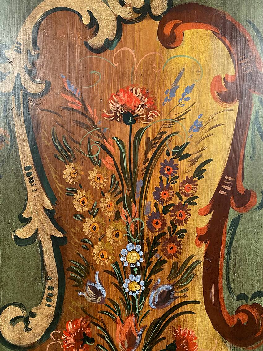 Alsatian bonnet maker in painted softwood with floral decorations