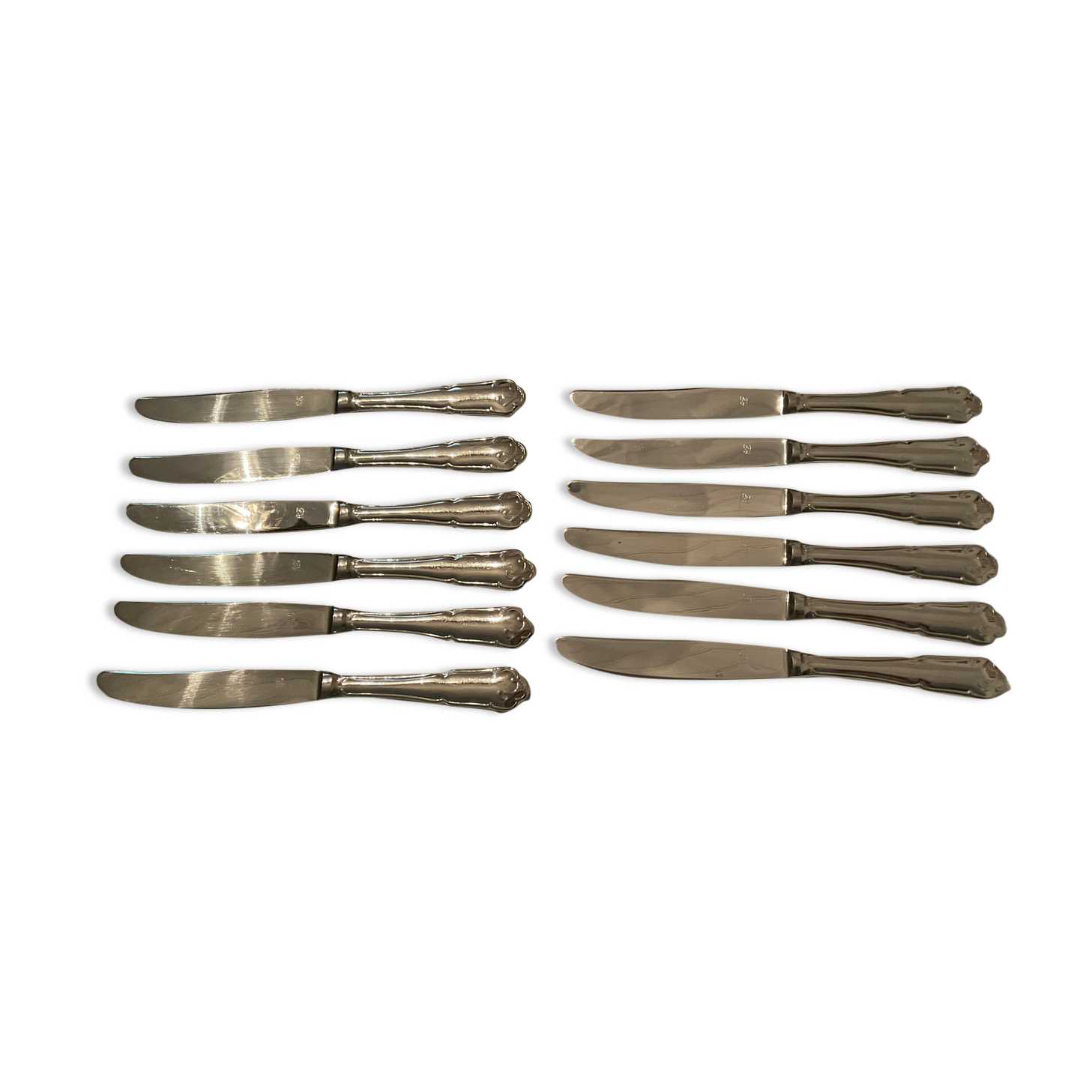 12 stainless steel knives. vintage