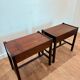 Pair of walnut bedside tables designed by Jacques Hauville for Roche Bobois.