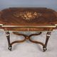 Middle table in rosewood veneer, Napoléon III period – 2nd half of the 19th century.