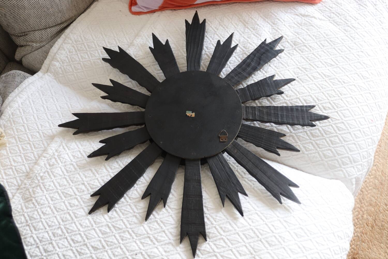 Antique black wooden sun mirror