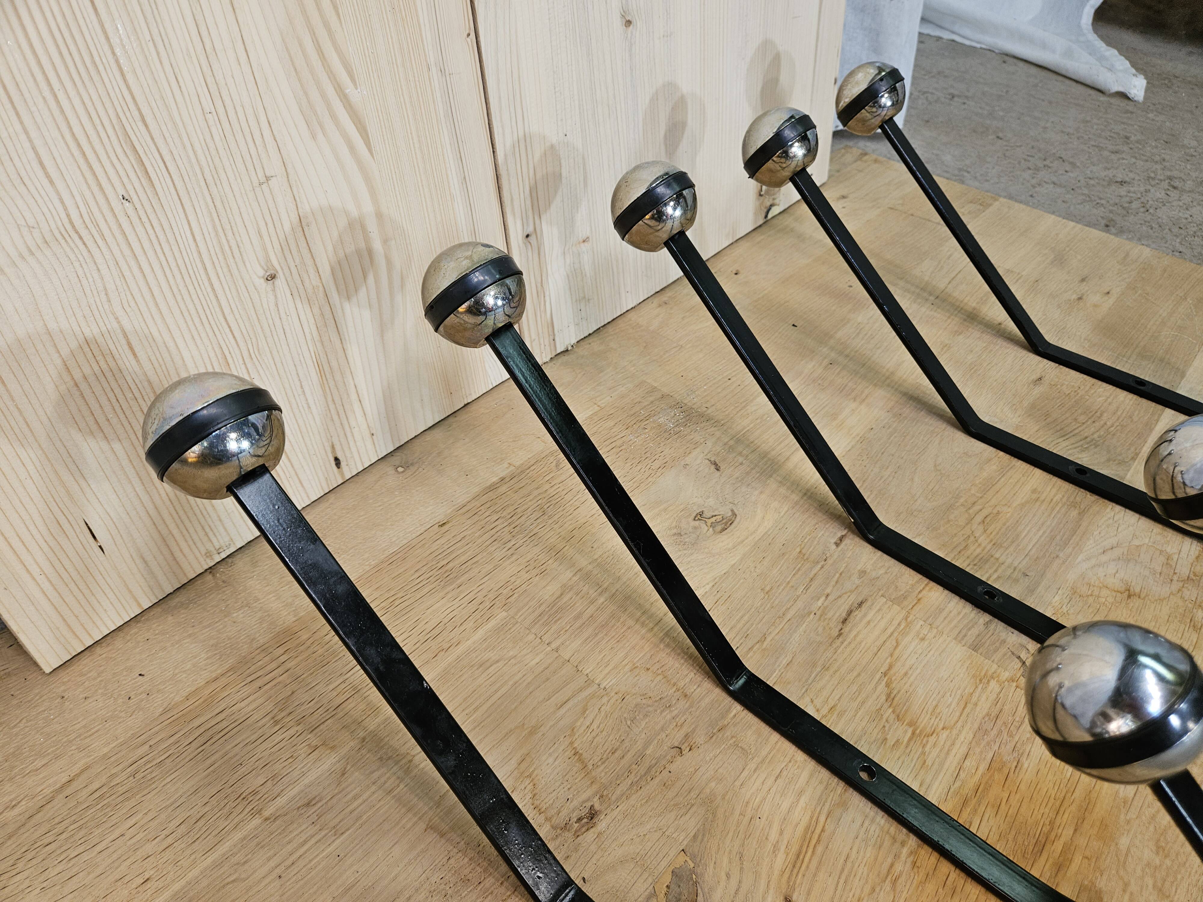 5 black and silver coat hooks from the 60s