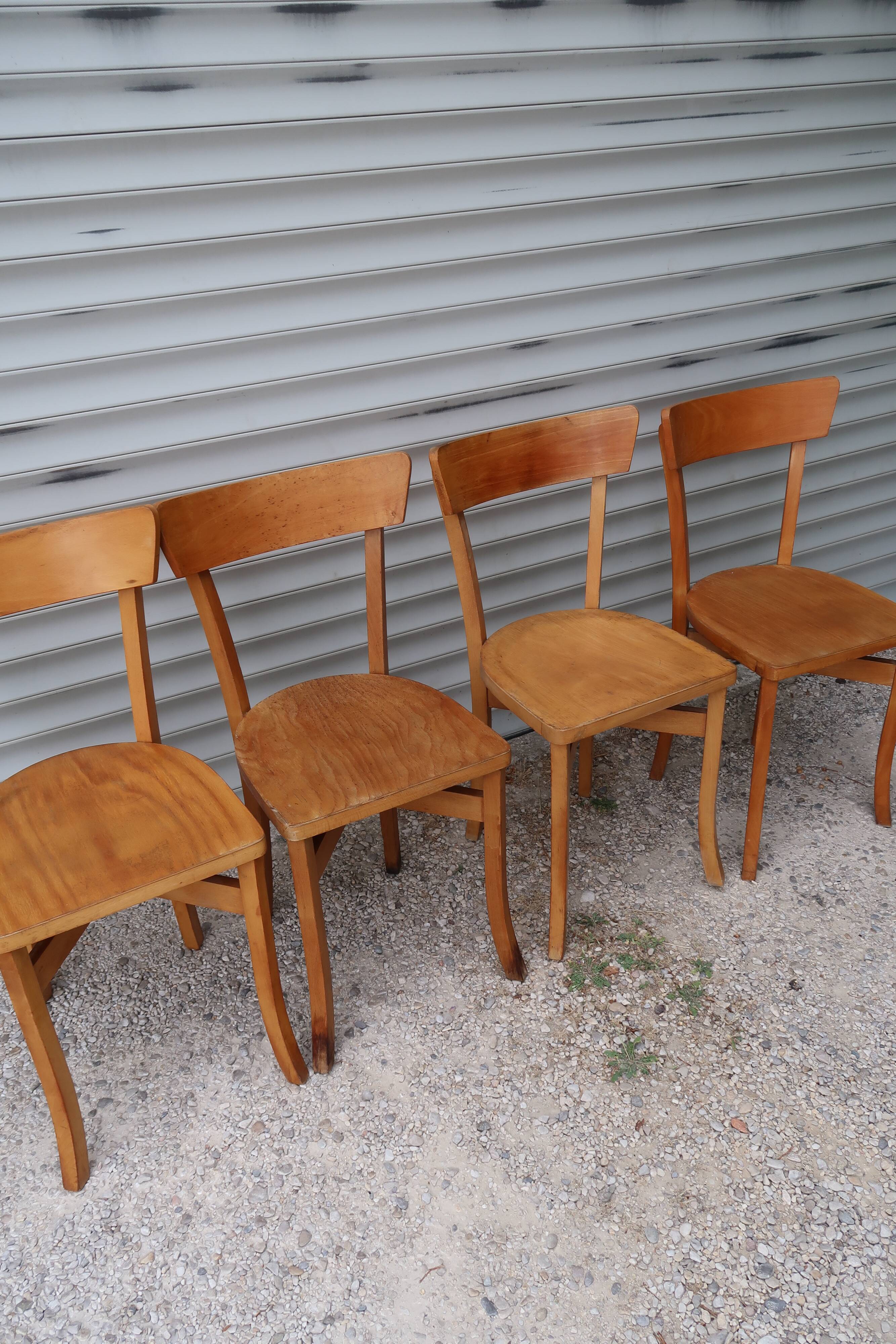 Set of 7 mismatched bistro chairs