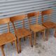Set of 7 mismatched bistro chairs
