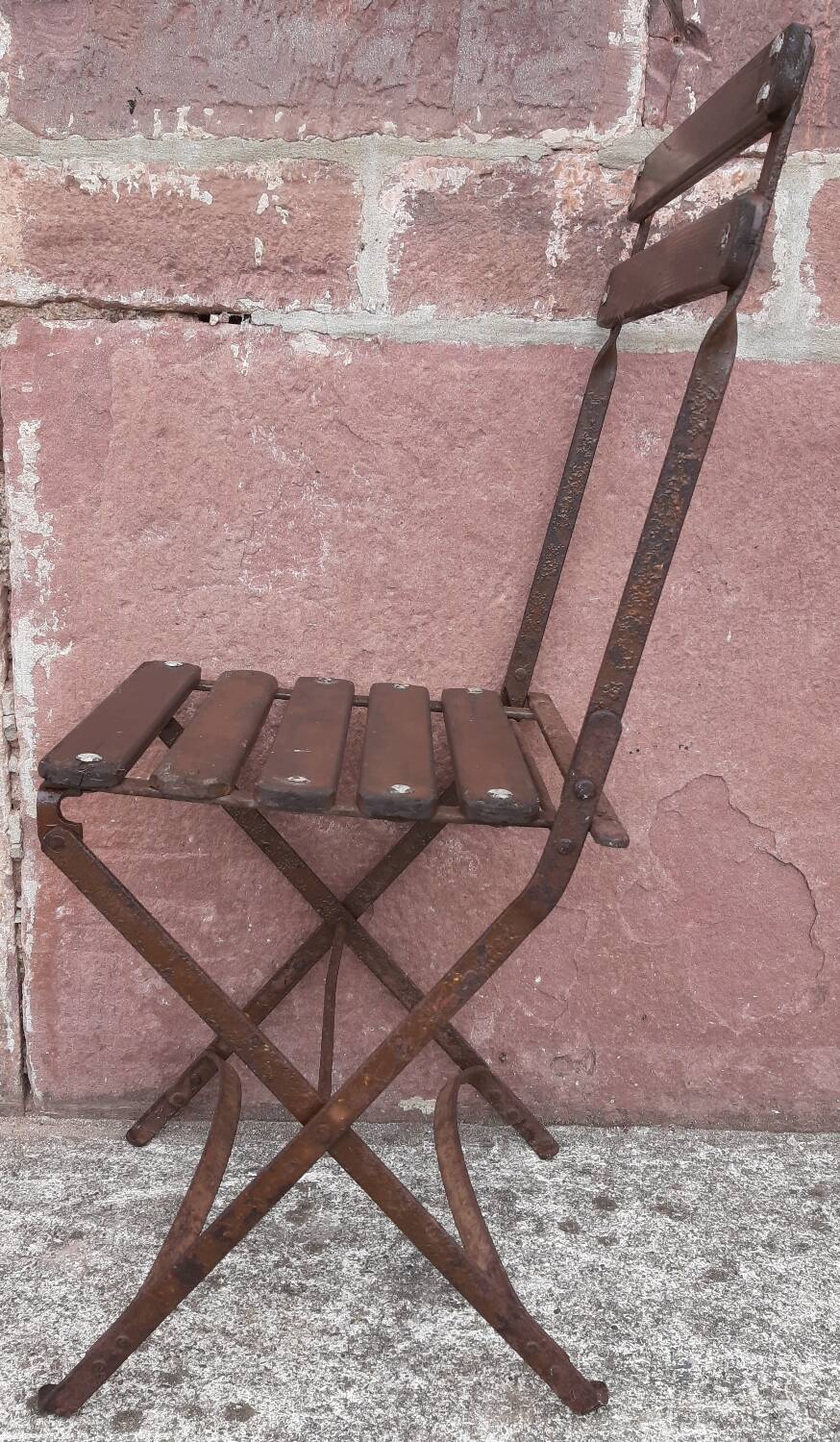 Foldable wrought iron chair