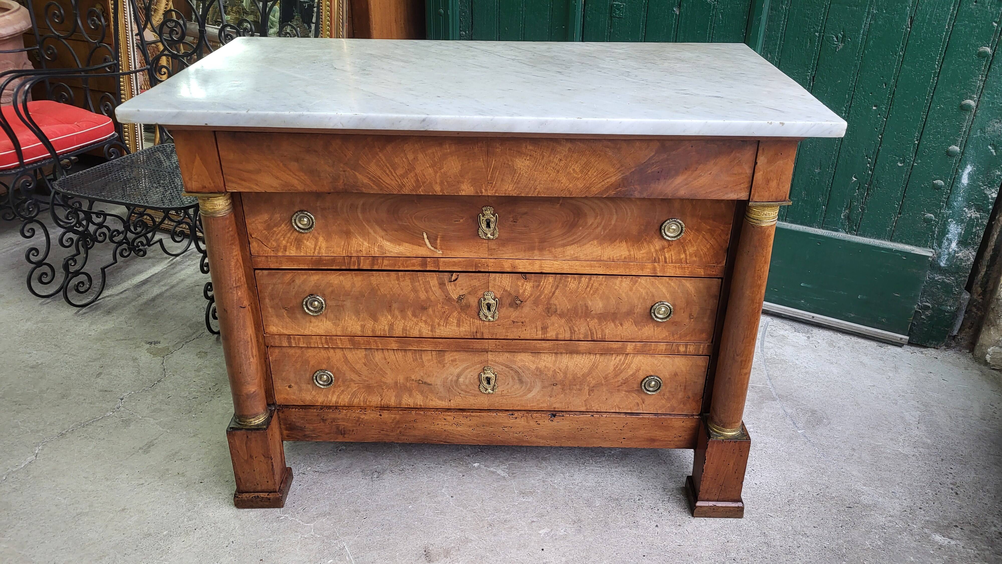 Empire commode in walnut with white marble top from the 19th century