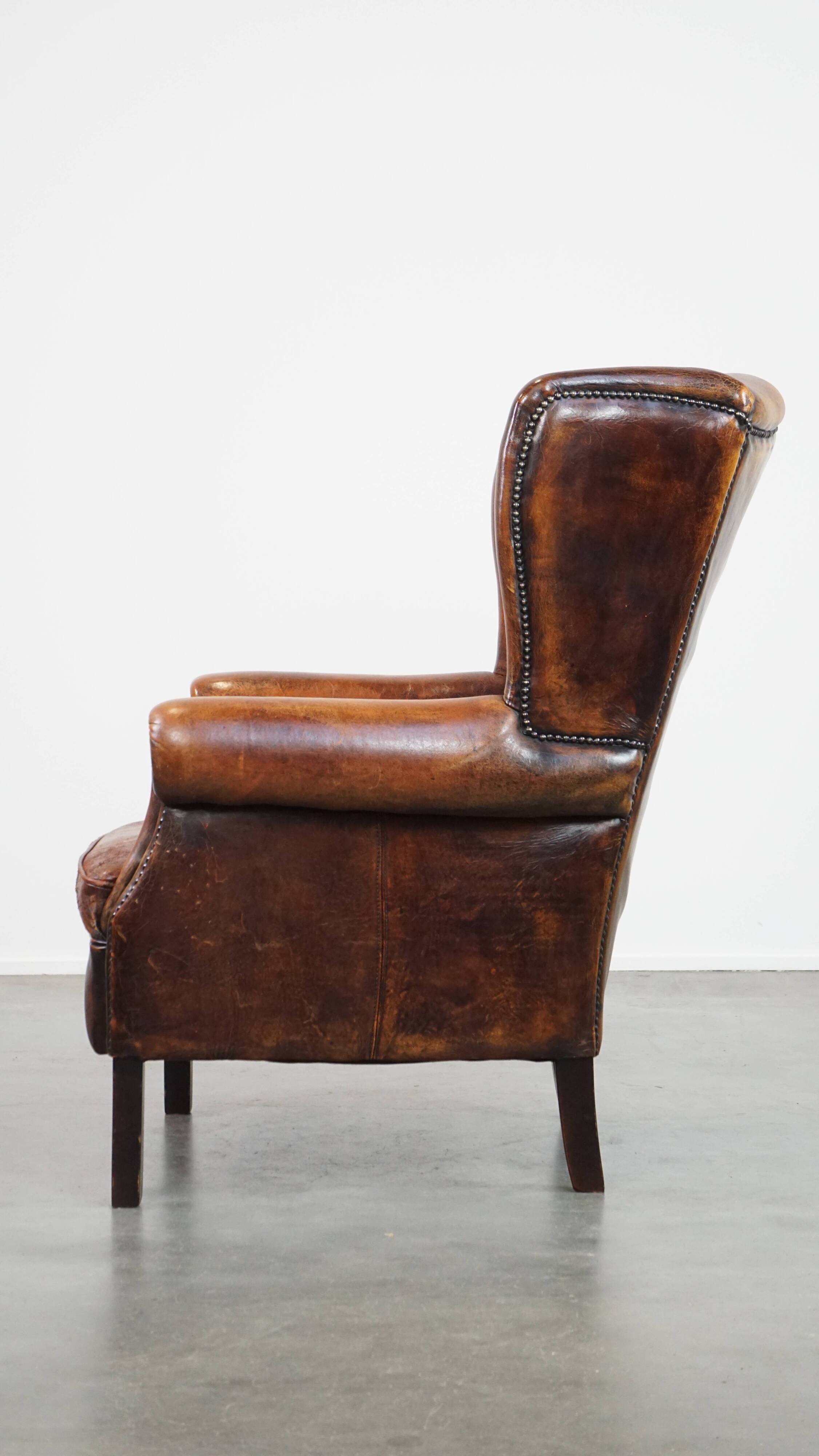 Vintage sheep leather wingback chair