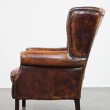 Vintage sheep leather wingback chair