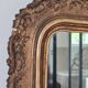 Antique Louis Philippe mirror with a pediment.
