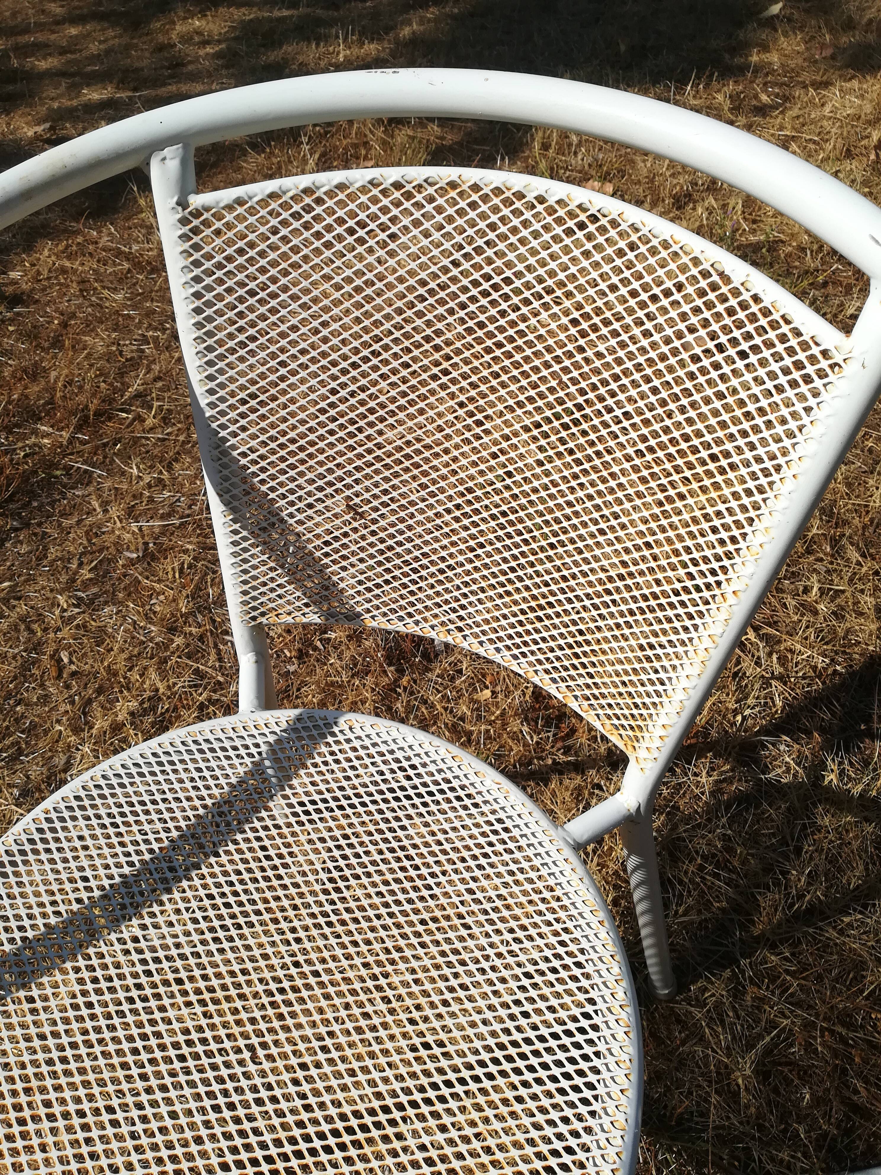 Pair of vintage white metal terrace armchairs